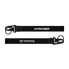 Two black straps with 'Hyryder' and 'Toyota' logos on a white background