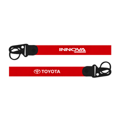 Two red lanyards with 'Innova' and 'Toyota' logos on a white background