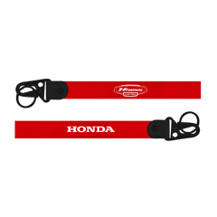 Red lanyard with 'Honda' and 'Husqvarna' branding on a white background