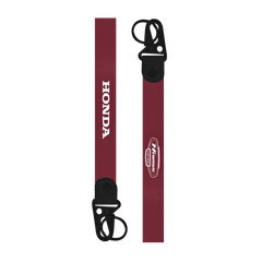 Maroon lanyard with black clips and Honda logo on a white background