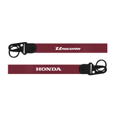 Two red lanyards with 'Unicorn' and 'Honda' logos on a white background