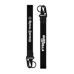 Two black straps with 'Guerilla' and 'Royal Enfield' branding on a white background