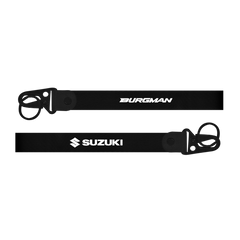 Two motorcycle chains with 'Burgman' and 'Suzuki' branding on a black background