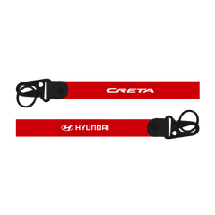 Red lanyard with 'CRETA' and 'HYUNDAI' branding on a white background