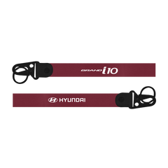 Maroon lanyard with 'i10' and Hyundai logos on a white background