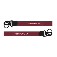 Red lanyard with Toyota and Camry logos on a white background