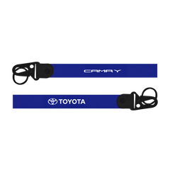 Two blue lanyards with 'Camry' and 'Toyota' branding on a white background