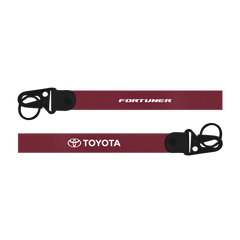 Two red lanyards with Toyota and Fortuner branding on a white background