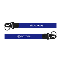 Two blue lanyards with 'Glanza' and 'Toyota' logos on a white background