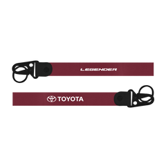 Maroon lanyard with 'Legender' and 'Toyota' logos on a white background