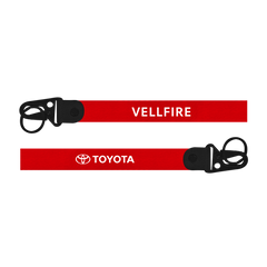 Red lanyard with 'Vellfire' and 'Toyota' branding on a white background