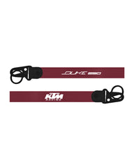 Maroon lanyard with black attachments featuring 'KTM Racing' and 'Duke 250' text on a white background.