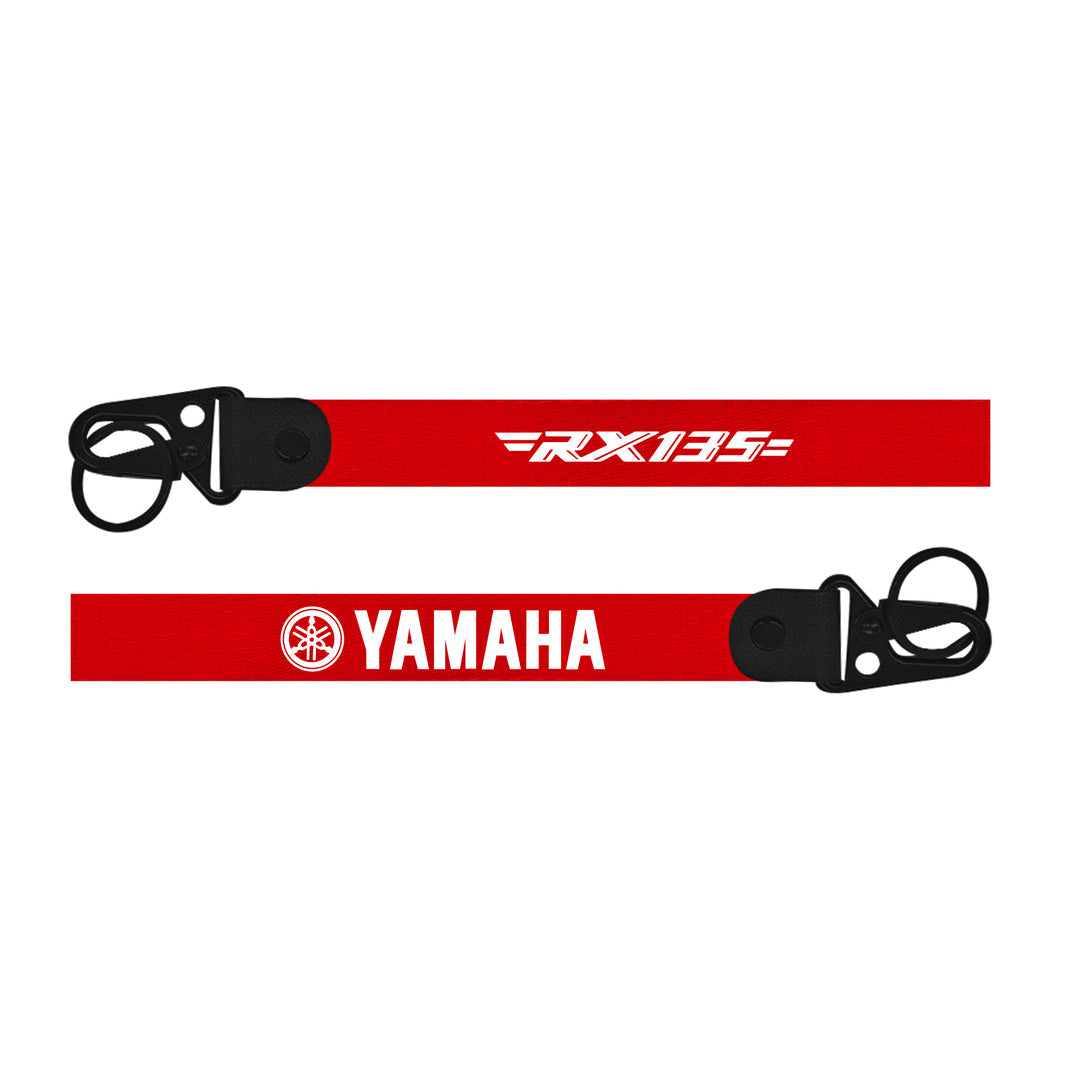 Red lanyard with 'RX135' and 'Yamaha' branding on a white background