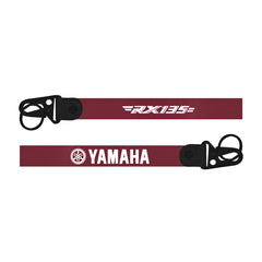 Maroon lanyard with Yamaha and RX135 branding on a white background