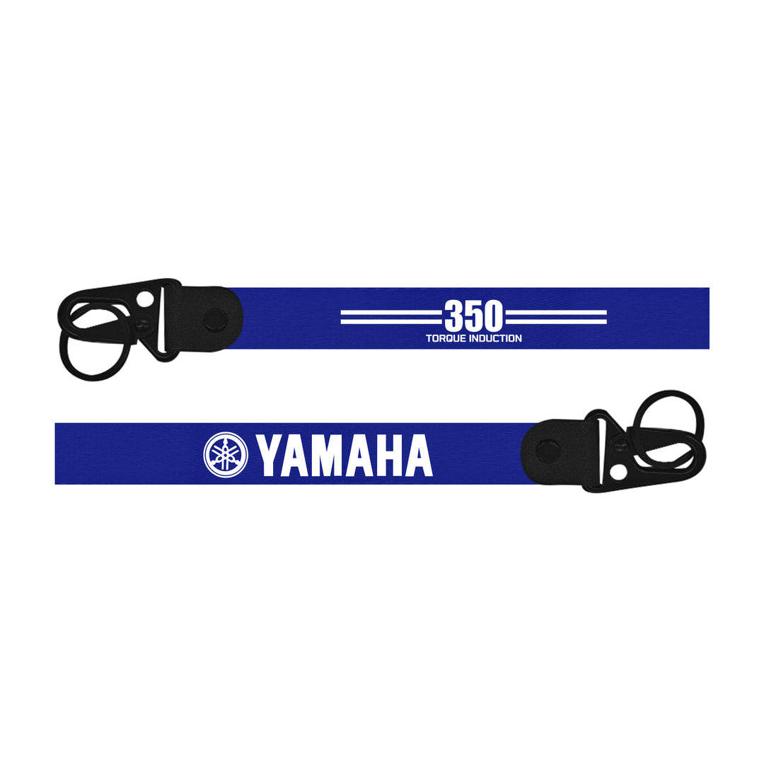 Two blue straps with black buckles, one featuring 'Yamaha' branding and the other '350 Torque Induction'.