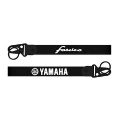 Black car dashboard cover with floral designs on a white background