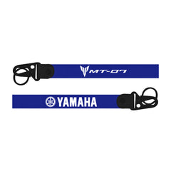 Two blue bike keychain straps with Yamaha branding on a white background