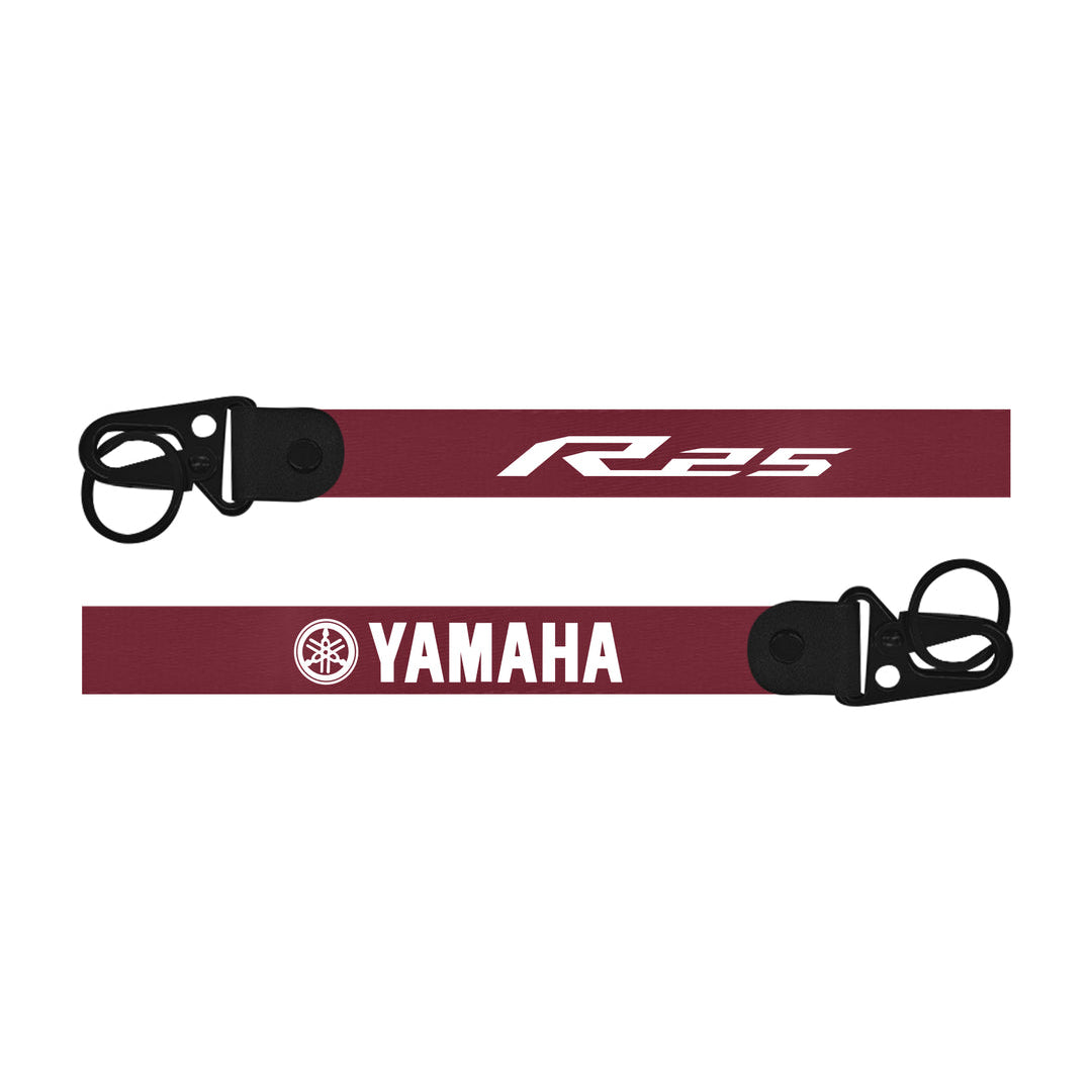 Yamaha R125 bike keychain motorcycle chain guard with black clamps on a white background