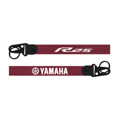 Yamaha R125 bike keychain motorcycle chain guard with black clamps on a white background