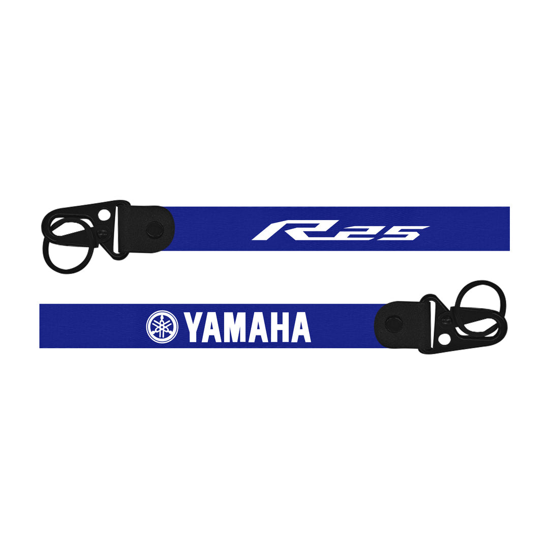 Blue bike keychain with 'Yamaha' and 'R25' branding on a white background