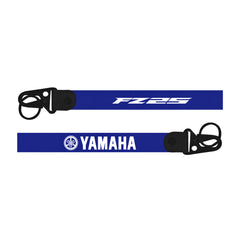 Two blue straps with 'Yamaha' and 'FZ-09' branding on a white background