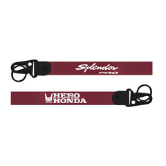 hero splendor pro keychain maroon Two red lanyards with black ends featuring 'Splendor Pro' and 'Hero Honda' logos on a white background.