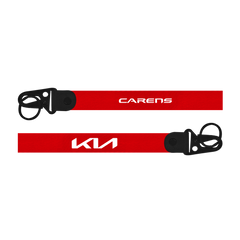 Red lanyard with 'Kia' and 'Carens' branding on a white background