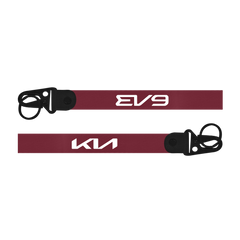 Two red lanyards with 'EV9' and 'Kia' branding on a white background