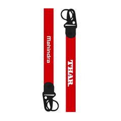 Red lanyard with 'THAR' and 'Mahindra' branding on a white background