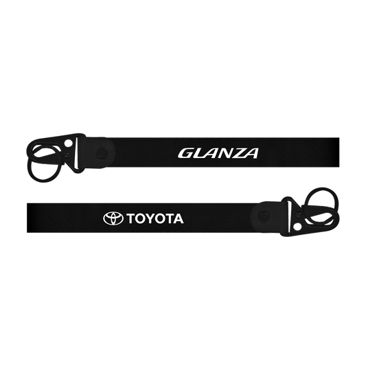 Two black lanyards with 'Glanza' and 'Toyota' logos on a white background
