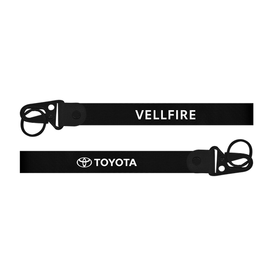 Black lanyard with 'Vellfire' and 'Toyota' branding on a white background