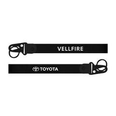 Black lanyard with 'Vellfire' and 'Toyota' branding on a white background