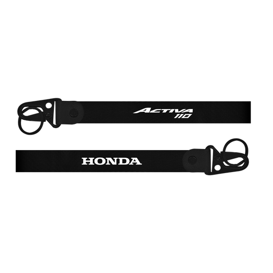 Two black keychains with 'Honda' and 'Activa 110' branding on a white background.