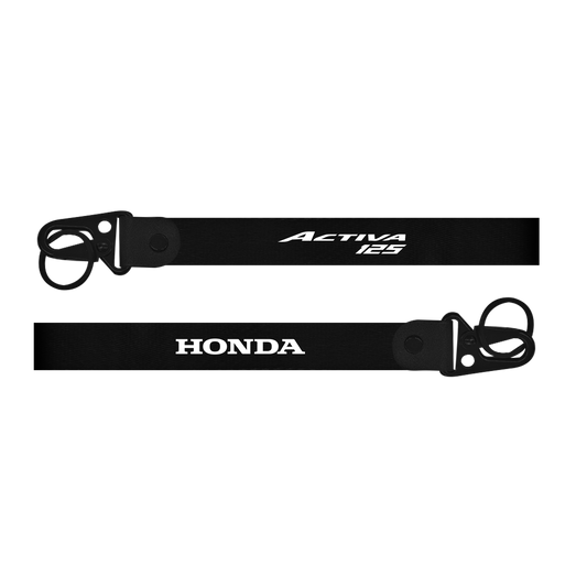 Two black keychains with 'Honda' and 'Activa 125' branding on a white background.