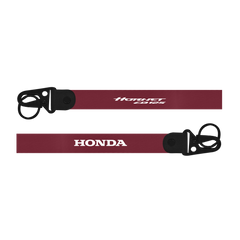Two maroon lanyards with 'Honda' and 'Hawkeye Laces' branding on a white background.
