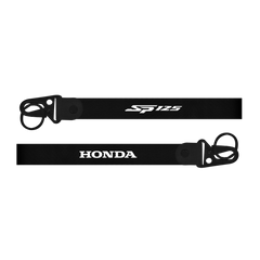 Two black lanyards with 'SP125' and 'Honda' branding on a white background