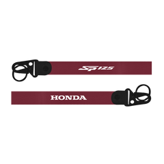 Maroon lanyard with 'SP125' and 'Honda' branding on a white background