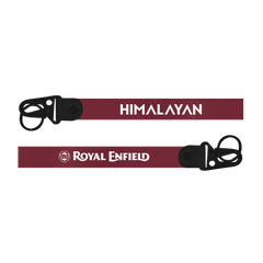 Two keychains with 'Himalayan' and 'Royal Enfield' branding on a white background.