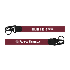 Two motorcycle seat covers with 'Hunter 350' and 'Royal Enfield' branding on a white background.