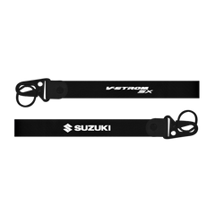 Two black straps with Suzuki and V-Strom SX branding on a white background