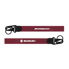 Two maroon straps with 'Burgman' and 'Suzuki' branding on a white background