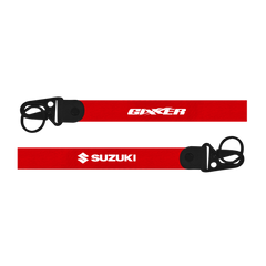Two red lanyards with 'Gixxer' and 'Suzuki' logos on a white background