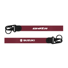 Two red straps with 'Gixxer' and 'Suzuki' branding on a white background