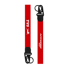 Two red straps with black buckles and logos on a white background