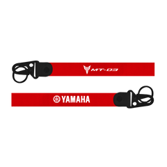 Red lanyard with Yamaha logo on a white background