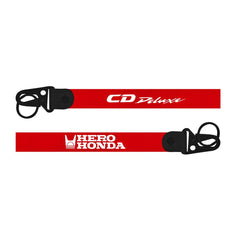 Hero Honda CD Deluxe Keychain red Two red lanyards with black buckles featuring 'CD Deluxe' and 'Hero Honda' logos on a white background.