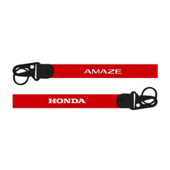 Two red lanyards with 'AMAZE' and 'HONDA' branding on a white background