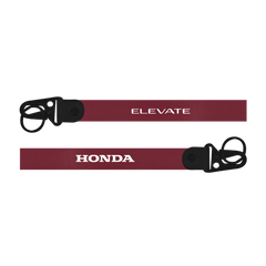 Two red lanyards with 'Elevate' and 'Honda' branding on a white background