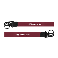 Red carabiner with 'CRETA' and 'Hyundai' branding on a white background