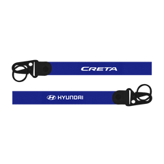 Two blue lanyards with 'Creta' and 'Hyundai' branding on a white background